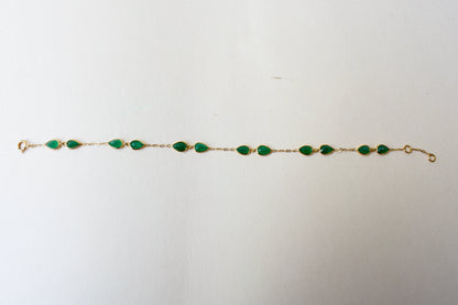18K gold bracelet with pear-cut emerald drops