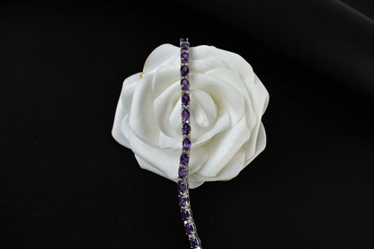 Oval-cut amethyst tennis bracelet with cubic zirconia accents in 925 silver
