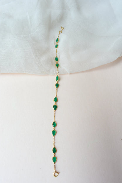 18K gold bracelet with pear-cut emerald drops