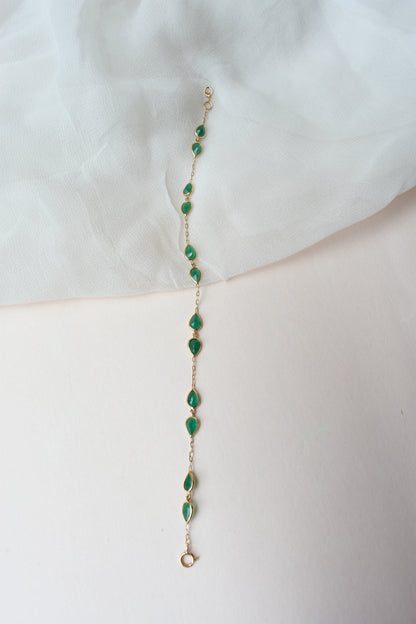 18K gold bracelet with pear-cut emerald drops