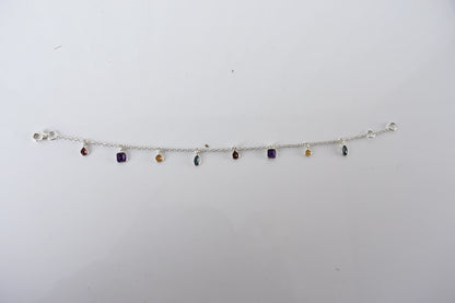 Multi gemstone charm bracelet with mixed-cut colored stones on a 925 silver chain
