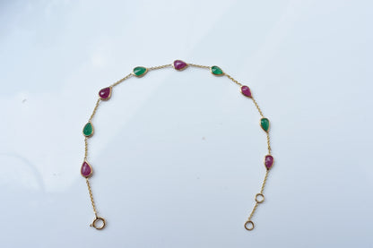 18K gold bracelet with alternating ruby and emerald drops