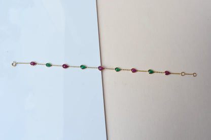18K gold bracelet with alternating ruby and emerald drops