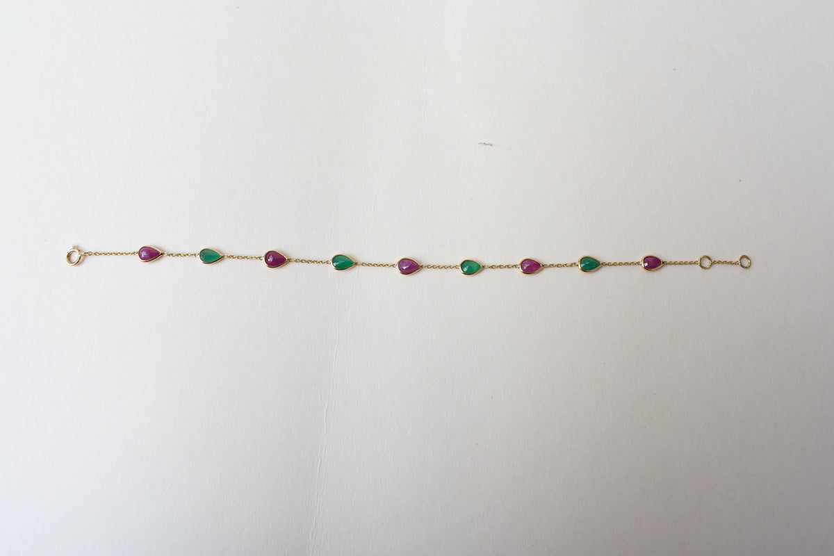18K gold bracelet with alternating ruby and emerald drops