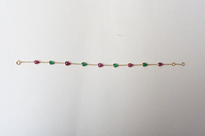 18K gold bracelet with alternating ruby and emerald drops