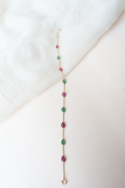 18K gold bracelet with alternating ruby and emerald drops