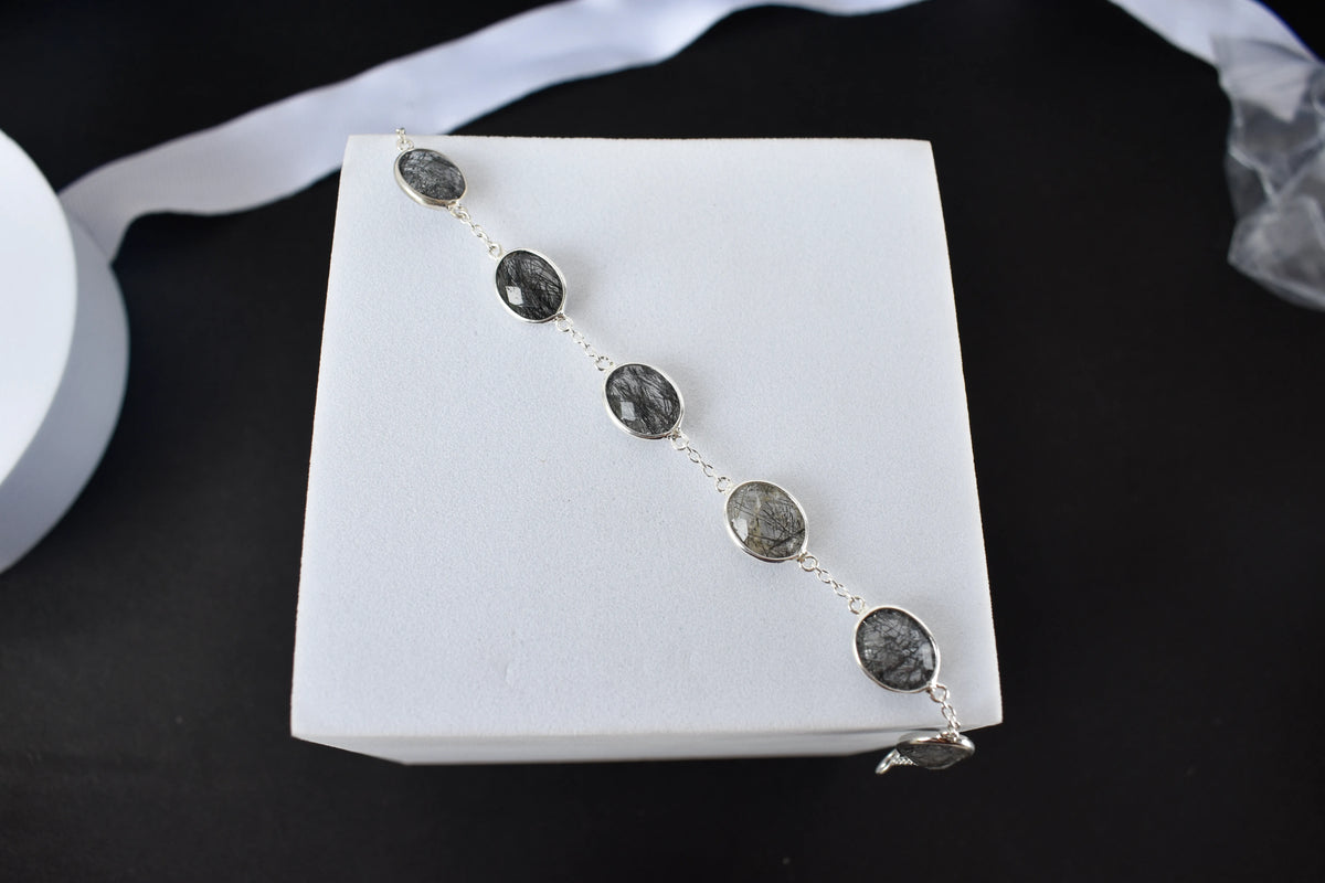 Black rutilated quartz bracelet with oval bezel-set stones in 925 silver