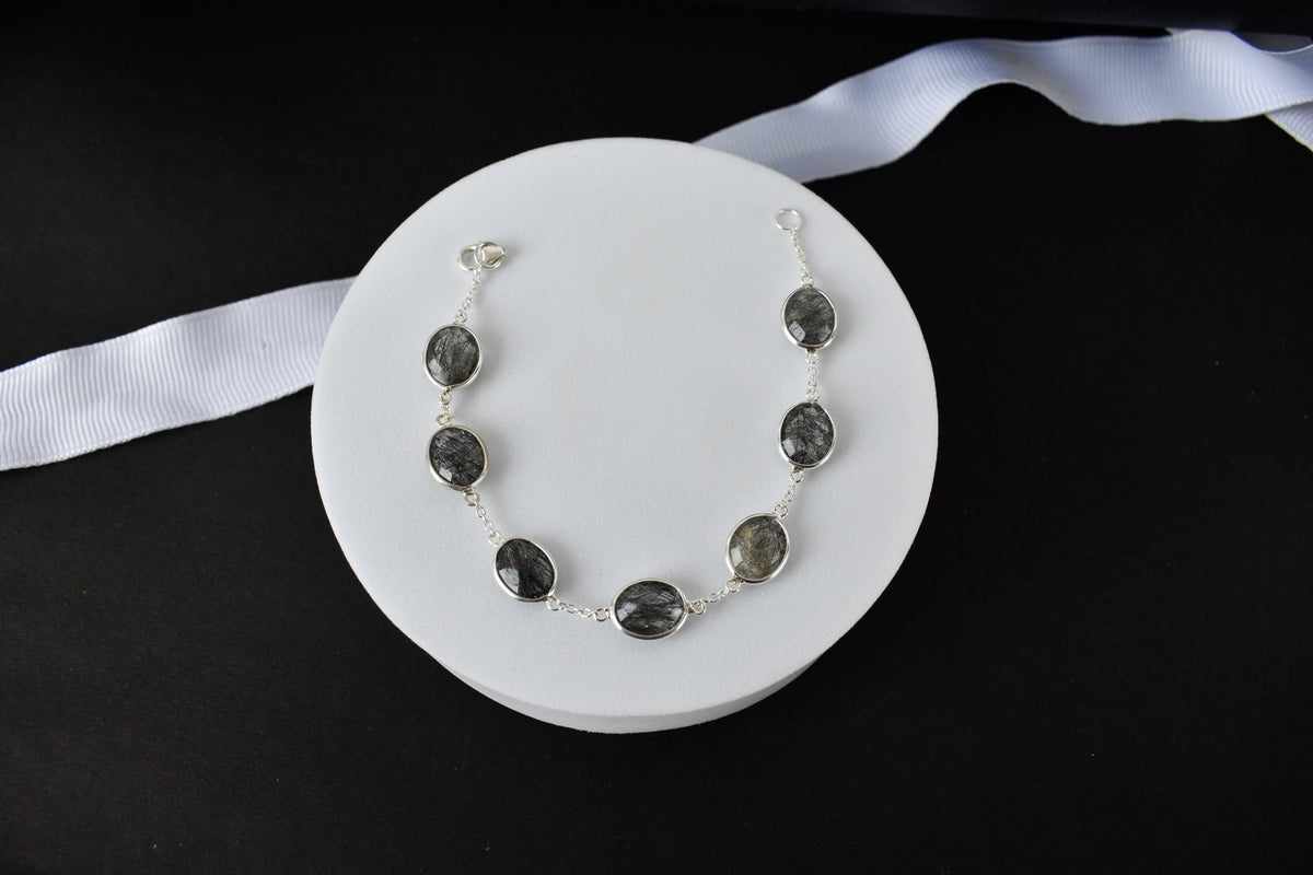 Black rutilated quartz bracelet with oval bezel-set stones in 925 silver