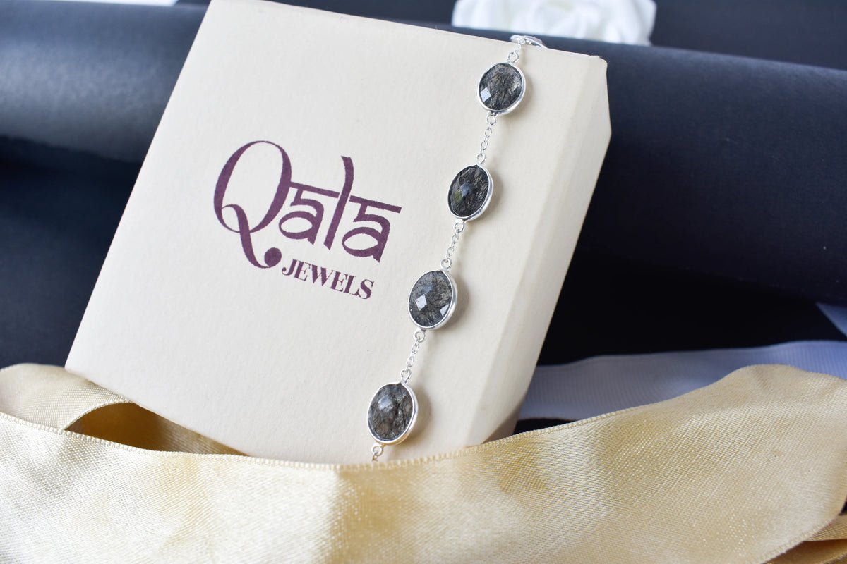 Black rutilated quartz bracelet with oval bezel-set stones in 925 silver