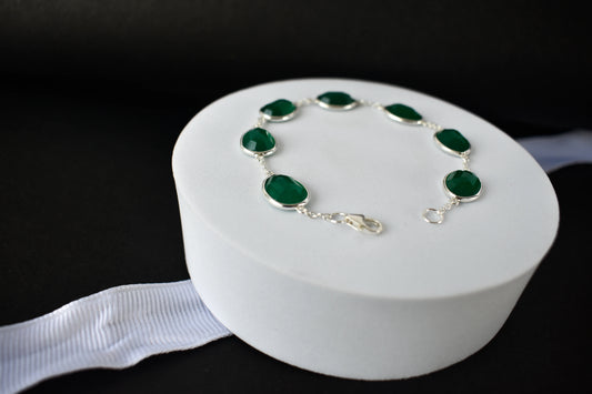 Faceted green onyx bracelet with bezel-set stones in 925 silver