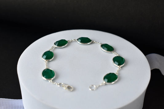 Faceted green onyx bracelet with bezel-set stones in 925 silver
