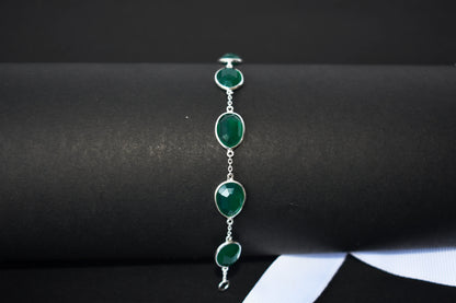 Faceted green onyx bracelet with bezel-set stones in 925 silver