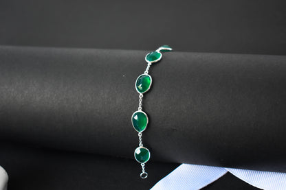 Faceted green onyx bracelet with bezel-set stones in 925 silver