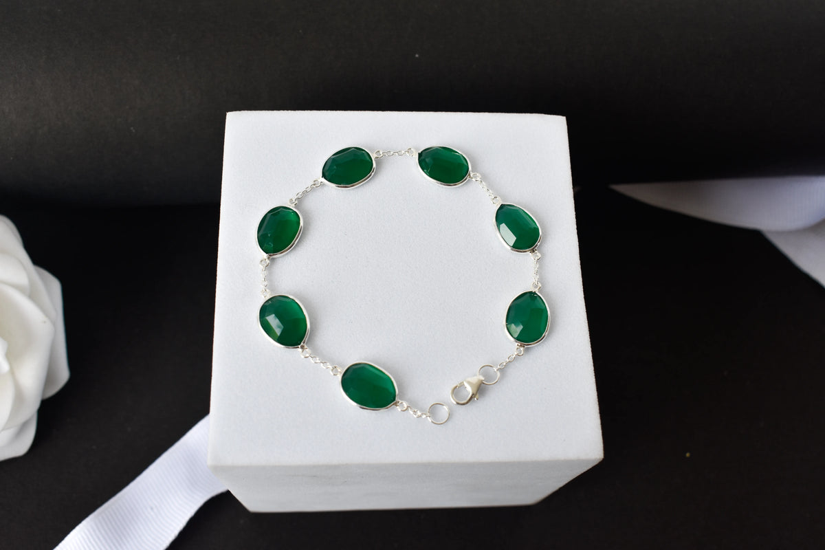 Faceted green onyx bracelet with bezel-set stones in 925 silver