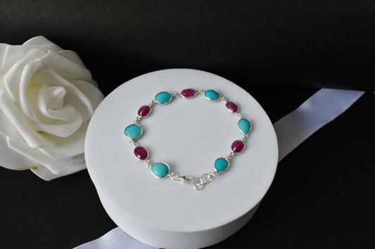 Ruby and turquoise cabochon bracelet with bezel-set stones in 925 silver