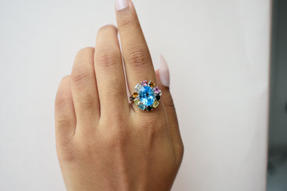 Swiss blue topaz ring with multicolor tourmaline halo in 925 silver