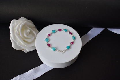 Ruby and turquoise cabochon bracelet with bezel-set stones in 925 silver
