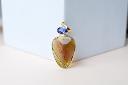 18K gold pendant with tourmaline slice and tanzanite accent