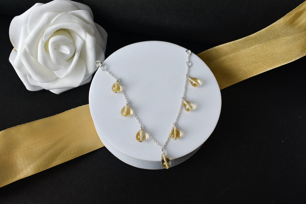 Citrine briolette dangle bracelet with faceted teardrops on a 925 silver chain