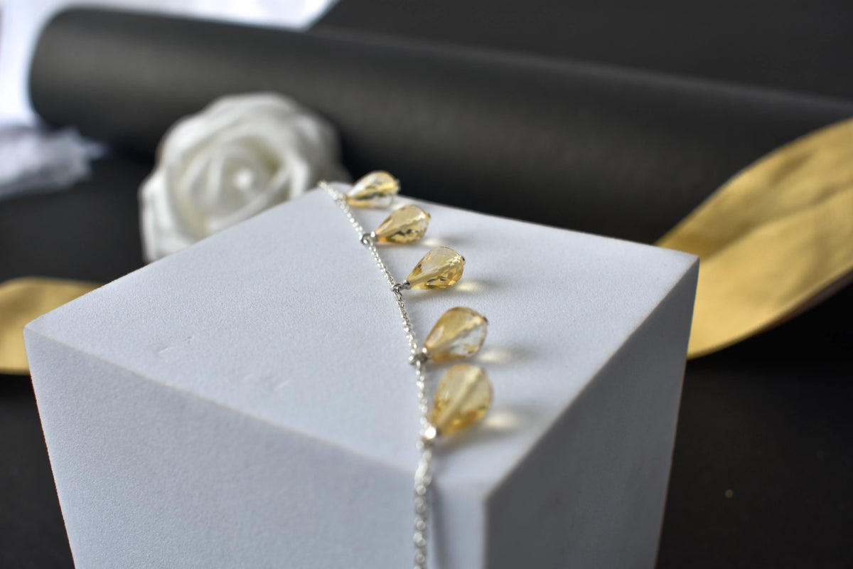 Citrine briolette dangle bracelet with faceted teardrops on a 925 silver chain