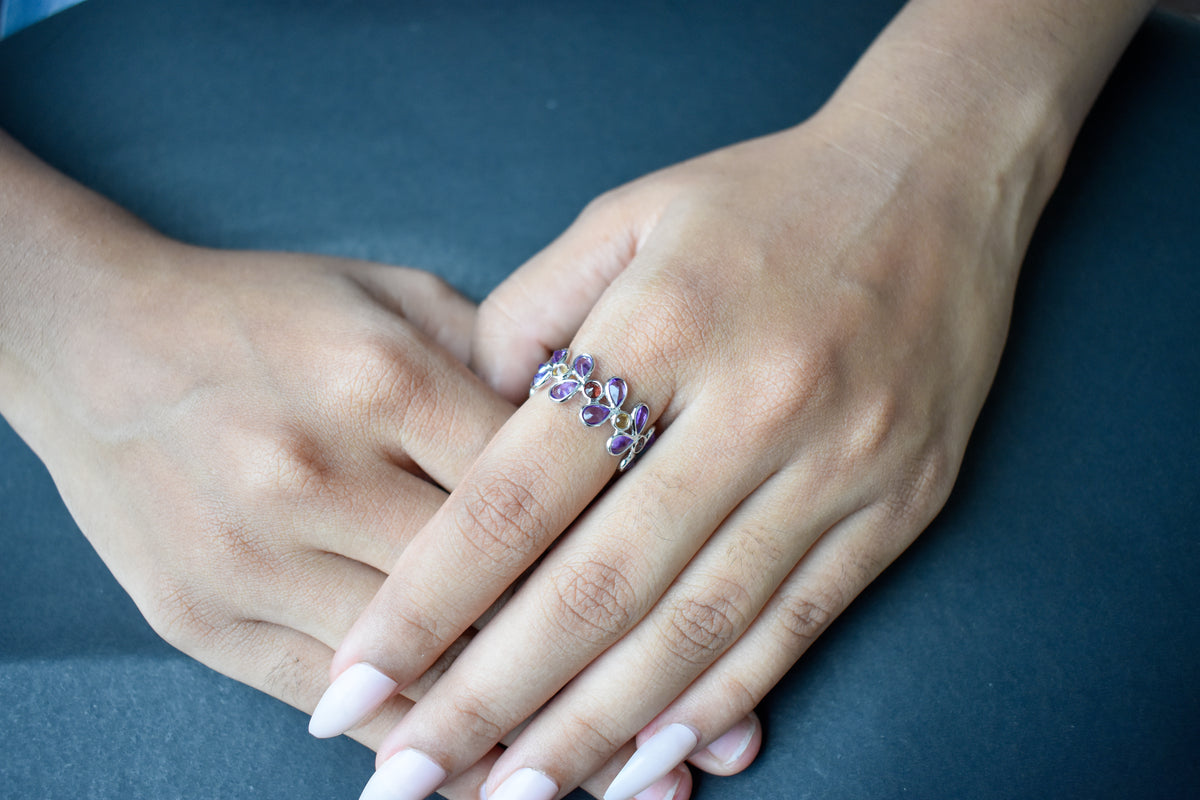 Multi gemstone marquise eternity ring in 925 silver with amethyst, garnet, and citrine-toned stones
