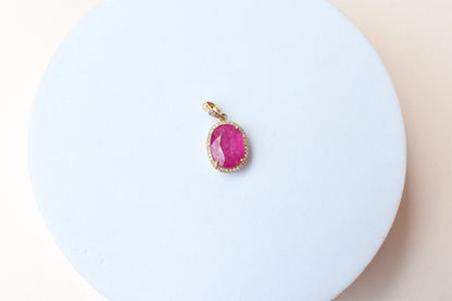 18K gold pendant with ruby and diamond halo