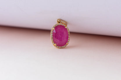 18K gold pendant with ruby and diamond halo