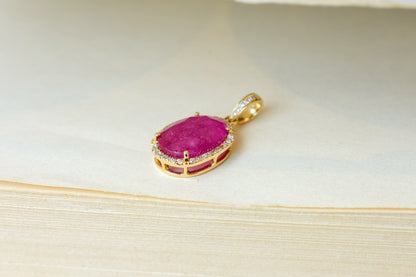 18K gold pendant with ruby and diamond halo
