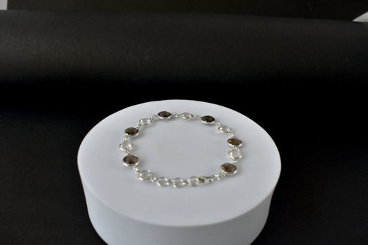 Rose quartz and smoky quartz bracelet with bezel-set stones in 925 silver