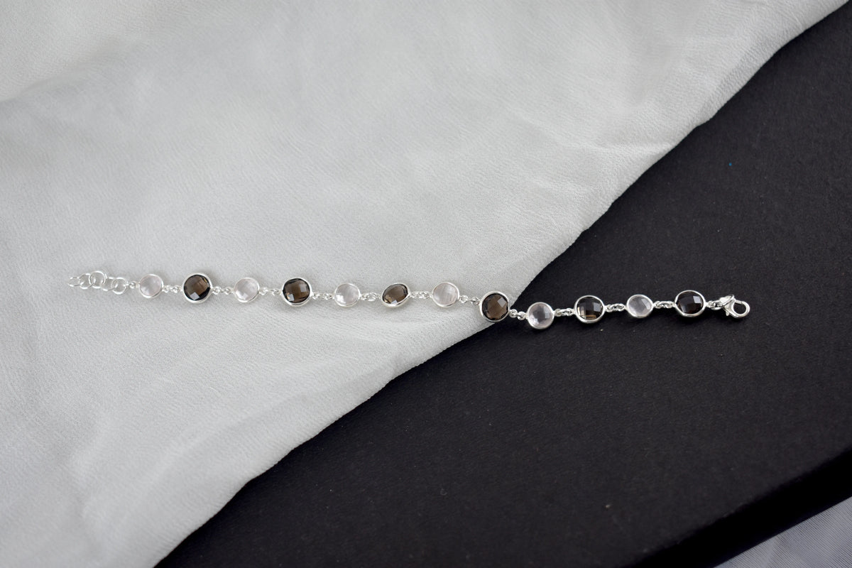 Rose quartz and smoky quartz bracelet with bezel-set stones in 925 silver