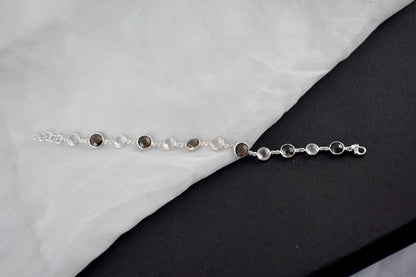 Rose quartz and smoky quartz bracelet with bezel-set stones in 925 silver