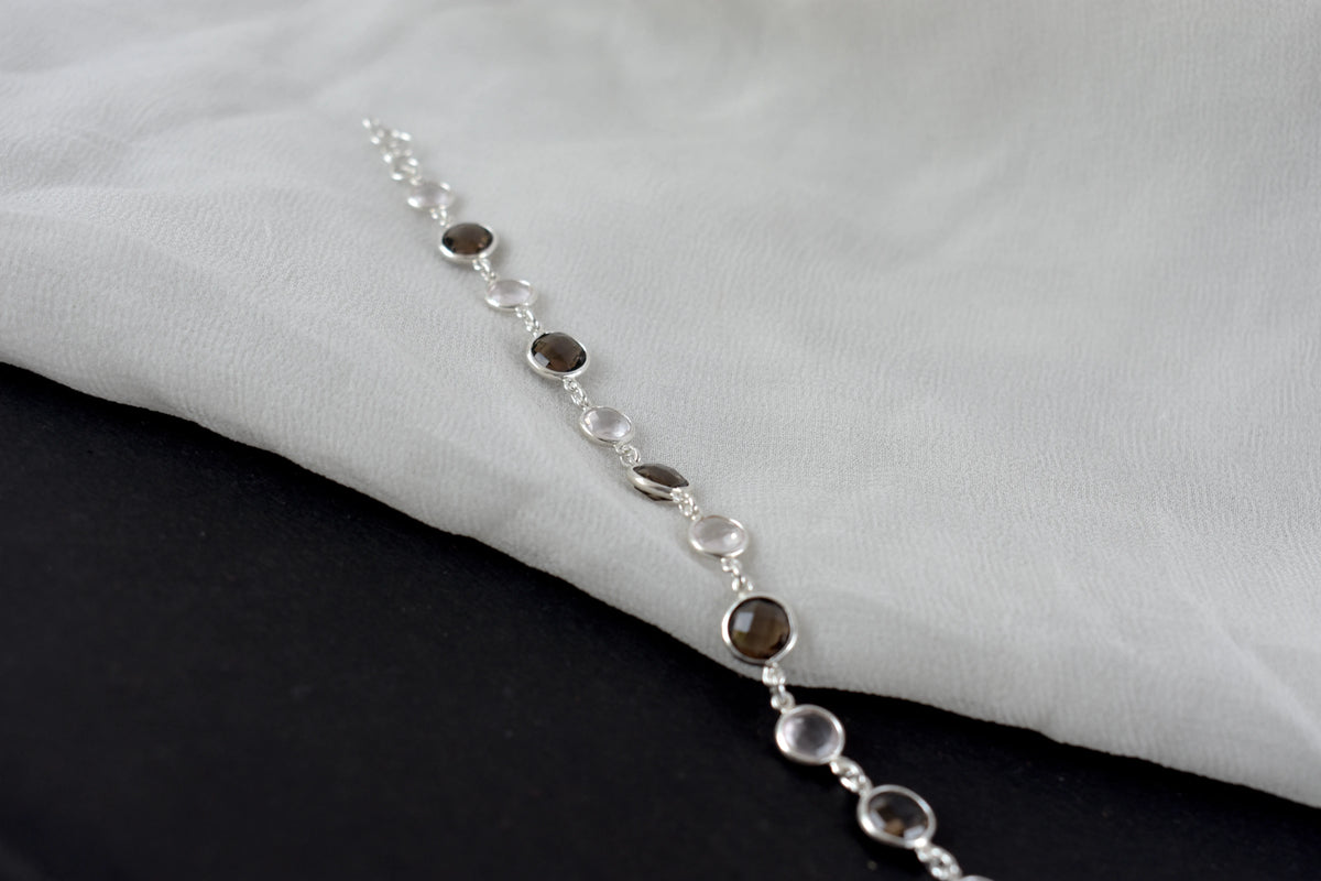 Rose quartz and smoky quartz bracelet with bezel-set stones in 925 silver