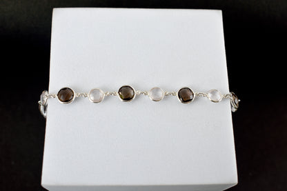 Rose quartz and smoky quartz bracelet with bezel-set stones in 925 silver