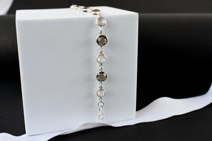 Rose quartz and smoky quartz bracelet with bezel-set stones in 925 silver