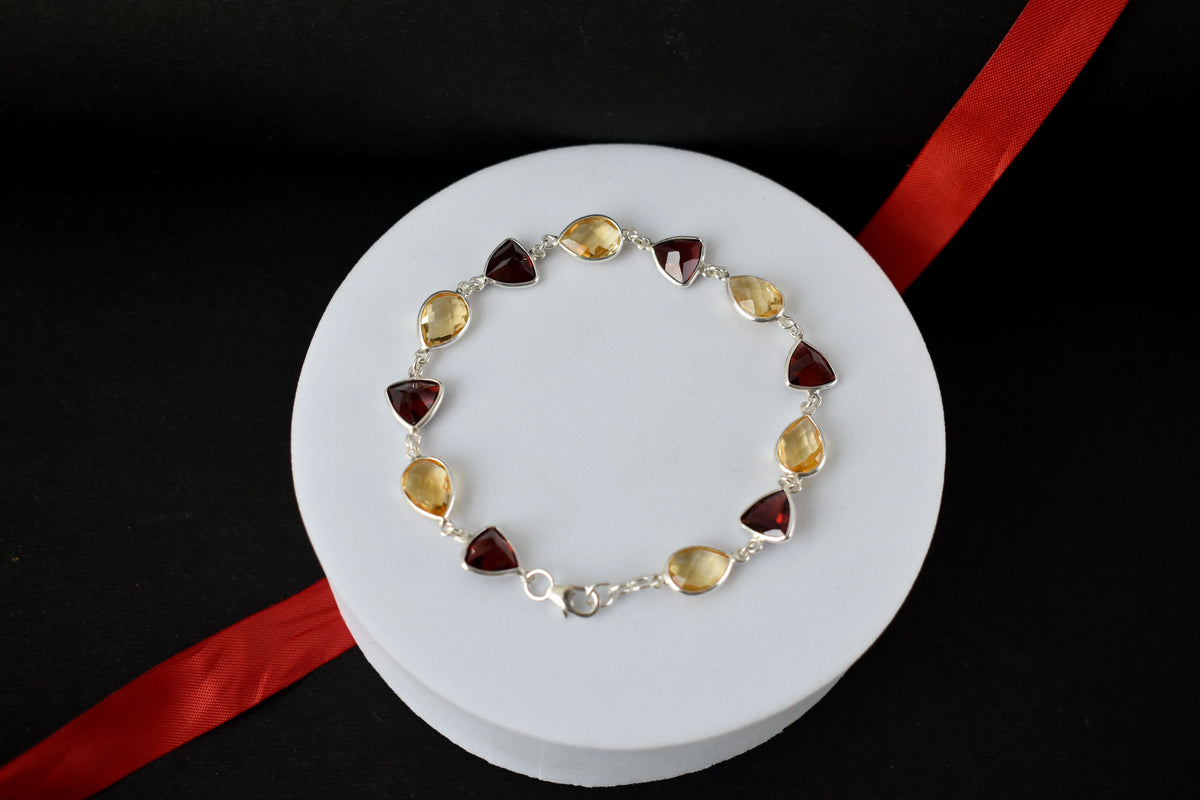 Rose quartz and smoky quartz bracelet with bezel-set stones in 925 silver