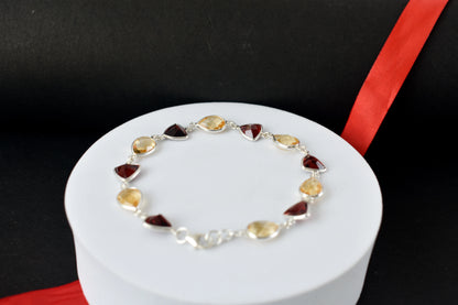 Rose quartz and smoky quartz bracelet with bezel-set stones in 925 silver