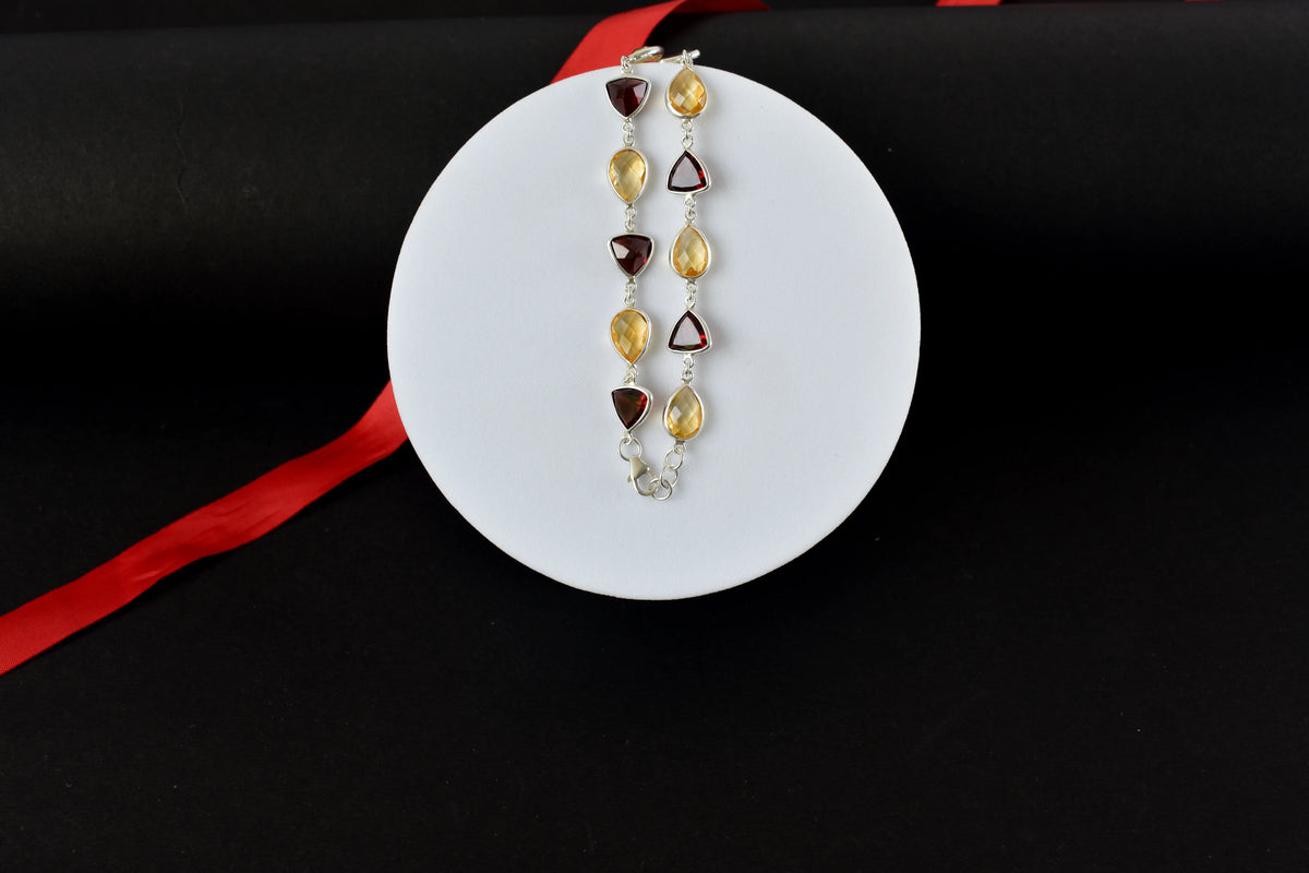 Rose quartz and smoky quartz bracelet with bezel-set stones in 925 silver