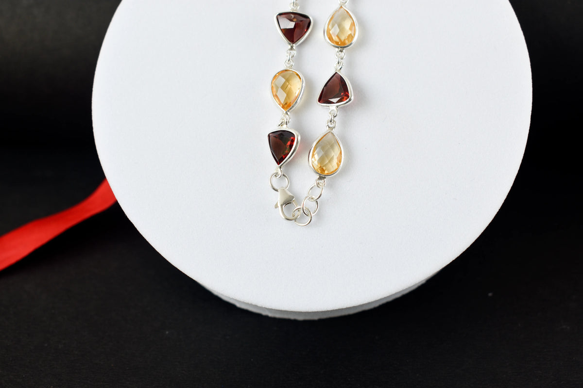 Rose quartz and smoky quartz bracelet with bezel-set stones in 925 silver