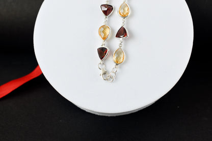 Rose quartz and smoky quartz bracelet with bezel-set stones in 925 silver