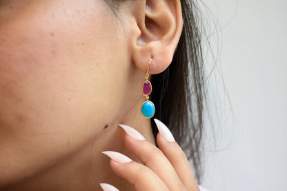 18K gold earrings with a rose quartz gemstone