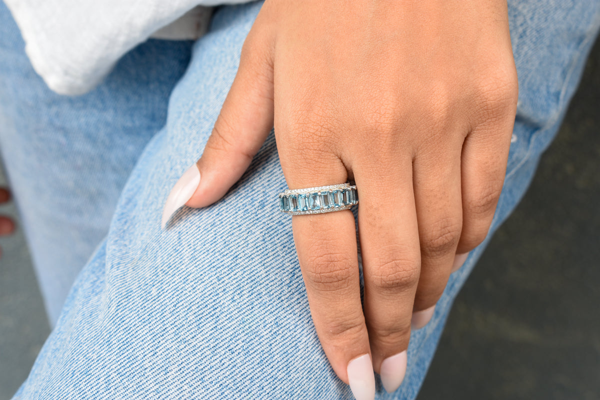 Sky blue topaz wide emerald-cut eternity ring in 925 silver