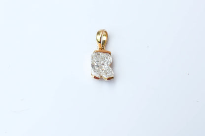 18K gold pendant with lab-grown diamond cut into the letter R