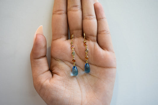 18K gold chain drop earrings with sapphire and blue topaz briolette