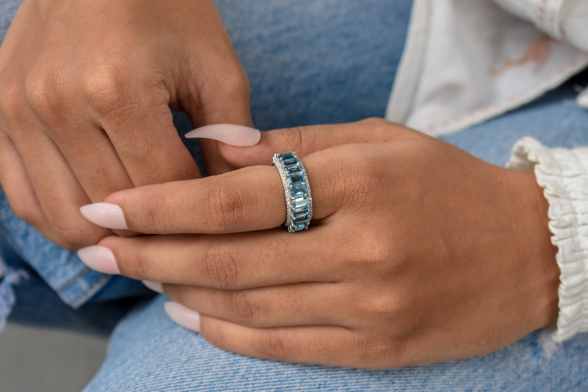 Sky blue topaz wide emerald-cut eternity ring in 925 silver
