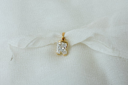 18K gold pendant with lab-grown diamond cut into the letter R