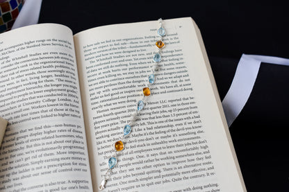 Citrine and blue topaz dangle bracelet with cubic zirconia accents in 925 silver