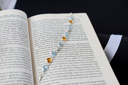 Citrine and blue topaz dangle bracelet with cubic zirconia accents in 925 silver