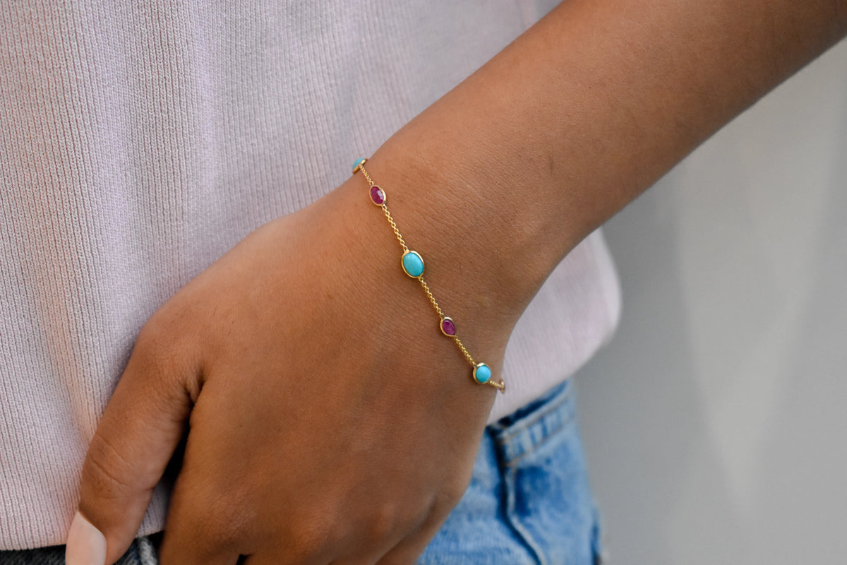 18K gold bracelet with turquoise and ruby stations