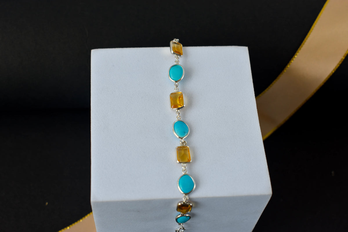 Citrine and turquoise bracelet with bezel-set stones in 925 silver