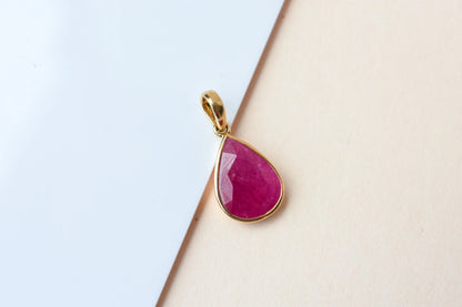 18K gold pendant with bezel-set rose-cut pear ruby